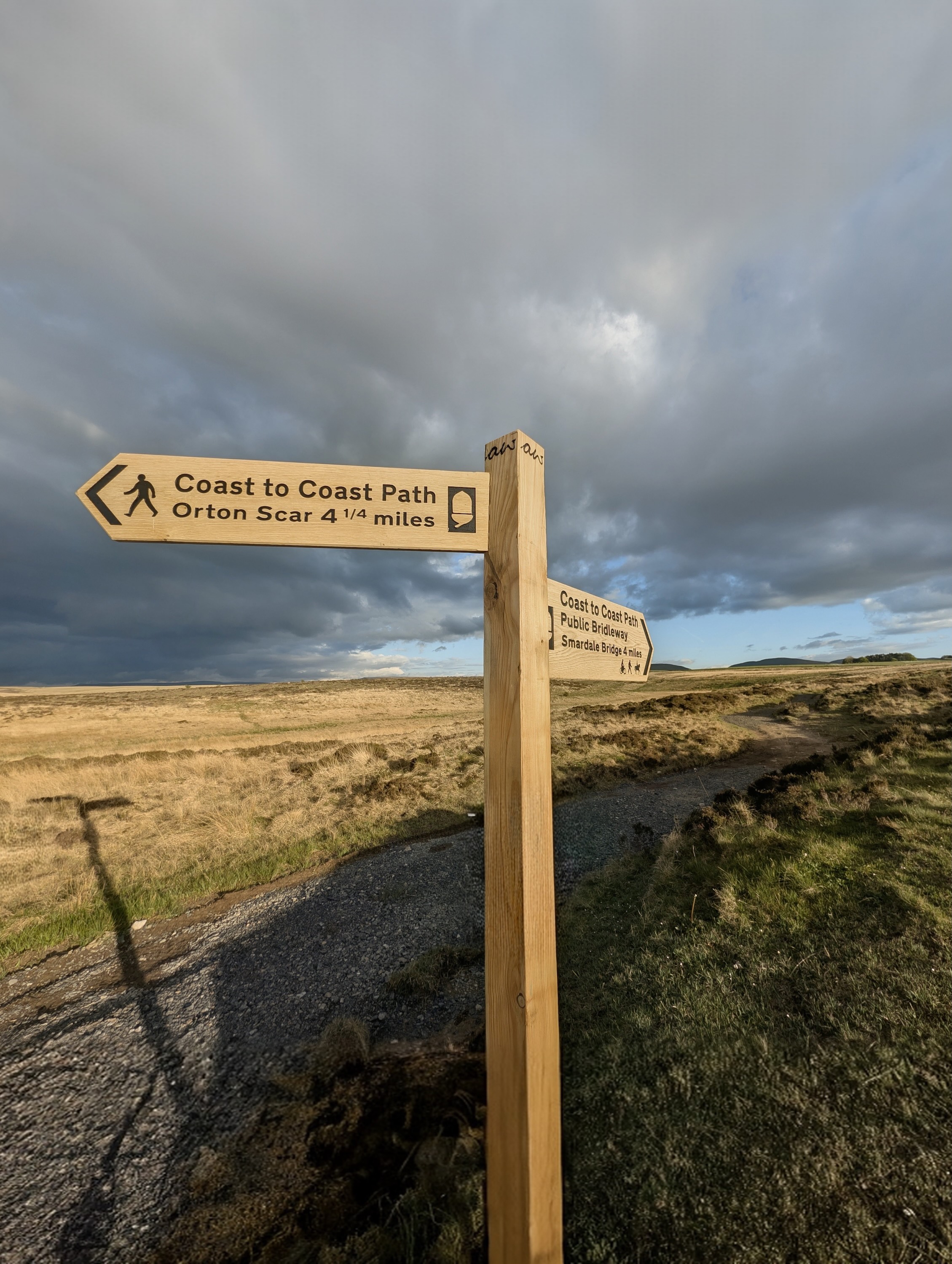 Coast to Coast National Trail sign near Sunbiggin Tarn, Yorkshire Dales, Cumbria